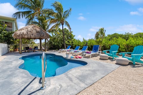 Cool off in your private pool surrounded by tropical landscaping, lounge seating, and plenty of Florida sunshine.