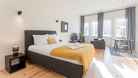 Bright main area with a cozy queen bed #comfort