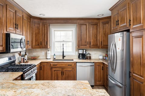Ready to rustle up a snack? Or whip together the perfect meal for family and friends? The fully-stocked kitchen has everything you need, from the latest appliances to plenty of cupboard space. Hide the carb stash in style with the oversized pantry!