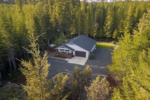Our home sits on 2.5 acres. This is the back corner of our land, but we back up to acres and acres of Green Diamond land, so the home is very private.
