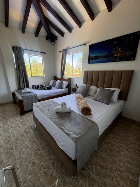 Family Quadruple Room | Down comforters, desk, free WiFi, bed sheets