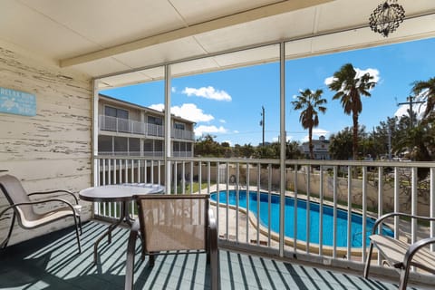 Screened in lanai overlooking the pool