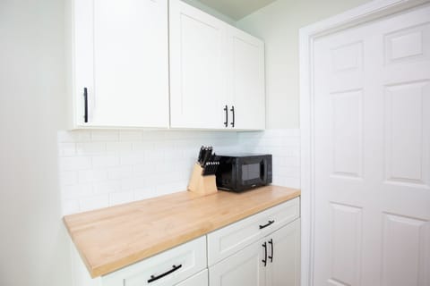 Elite Cabin, Beach View | Private kitchen | Mini-fridge, microwave, coffee/tea maker, dining tables