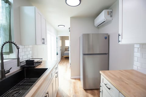 Elite Cabin, Beach View | Private kitchen | Mini-fridge, microwave, coffee/tea maker, dining tables