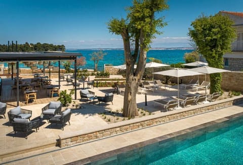 Seasonal outdoor pool, sun loungers