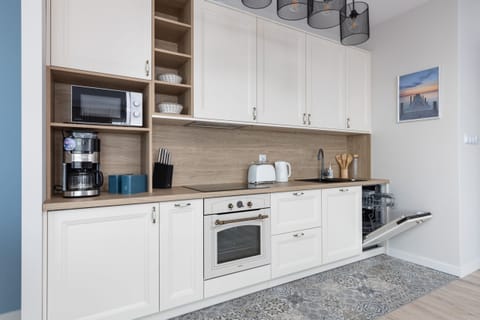 A charming kitchen corner with functional features and a welcoming ambiance.


