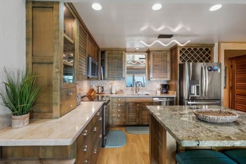 Condo, 2 Bedrooms | Private kitchen | Fridge, oven, coffee/tea maker