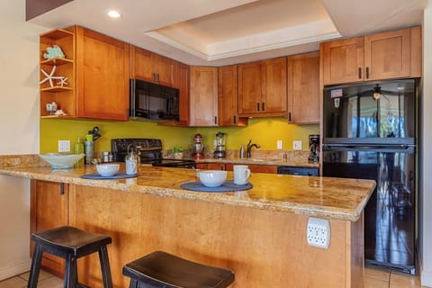 Condo, 1 Bedroom | Private kitchen | Fridge, oven, dishwasher, coffee/tea maker