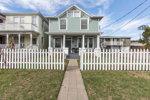 Step onto the spacious porch and soak in the coastal charm of Galveston!