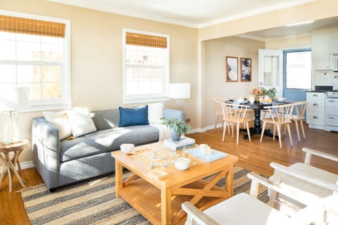 An open floor plan connects the living room with the dining area.