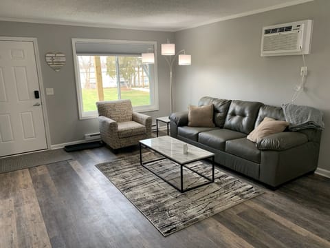 Spacious living room with cozy furniture! 