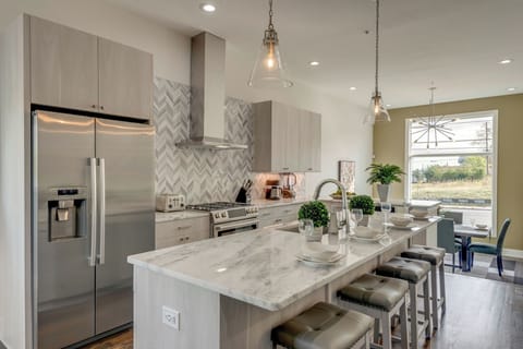 Fully equipped chef's kitchen featuring a large island - perfect for group brunch prep!