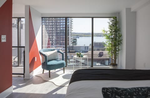 Premium Penthouse, 1 Queen Bed, Balcony, Harbor View | Down comforters, desk, laptop workspace, blackout drapes
