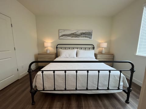 Stay awhile! Rest up and rejuvenate in a king bed. Bedroom includes en-suite bathroom, walk-in closet chair, and two dressers.