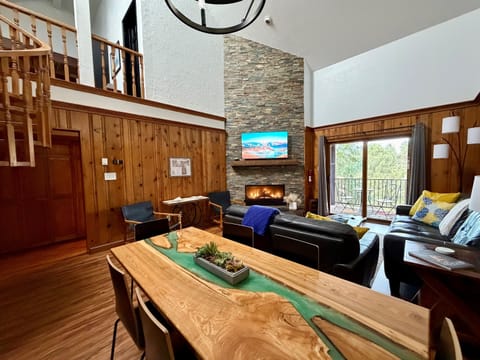 Vaulted ceilings & cozy fireplace – love the space to gatheR