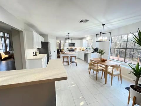 Open airy space with amazing views of nature in every window!