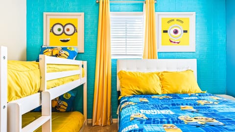 Enjoy the flexibility and comfort of our Minions Inspired room with three beds, providing you with a cozy and restful retreat during your stay.