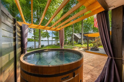 Welcome to Sunny Daze! Hot tub perfect location to unwind after a long day on the lake.