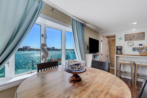 Bright coastal living room with comfortable seating and stunning Intracoastal Waterway views
