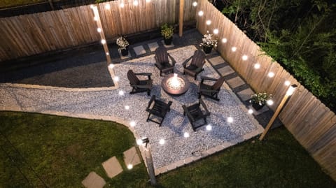 Gather around the cozy gas fire pit with your friends or family to enjoy a dancing fire, bringing warmth and comfort as you enjoy each other's company.