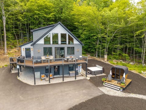 Beautifully constructed chalet-style home. Relax on the deck w/ 3 private acres.