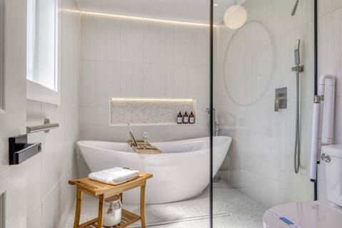 Unwind in style. Treat yourself to a relaxing soak in our deep, luxurious freestanding tub—the perfect way to recharge after a full day of exploring.