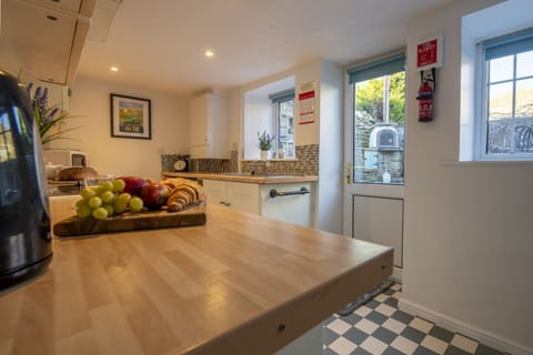 Ground floor: Kitchen leading out onto the patio area