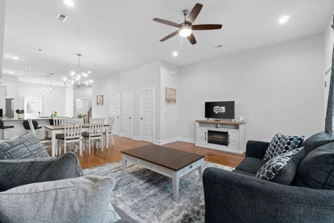 Living Room w/ Indoor Electric Fireplace & Dining Area
