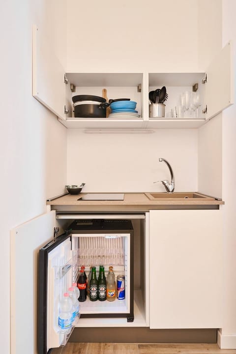 Superior Quadruple Room, Non Smoking, City View | Private kitchen | Fridge, coffee/tea maker, electric kettle