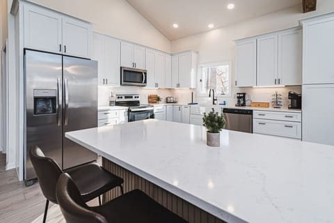 The kitchen offers plenty of storage and access to host a large group