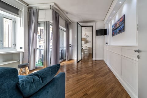 Deluxe Condo | Living area | Heated floors