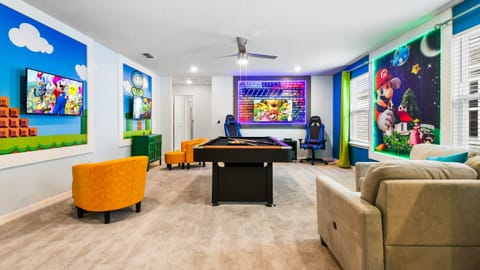 Have a hit of pool with friends in the upstairs game loft