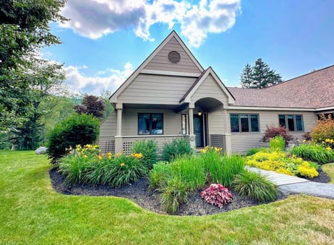 Step into this beautifully appointed Fairway Village garden-style townhouse, where comfort meets elegance in the heart of Bretton Woods.