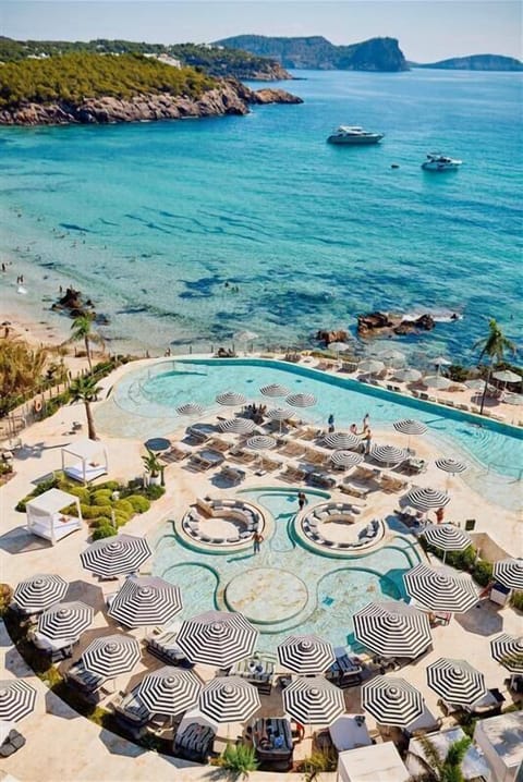 Indoor pool, 3 outdoor pools, open 11:30 AM to 7:30 PM, pool umbrellas