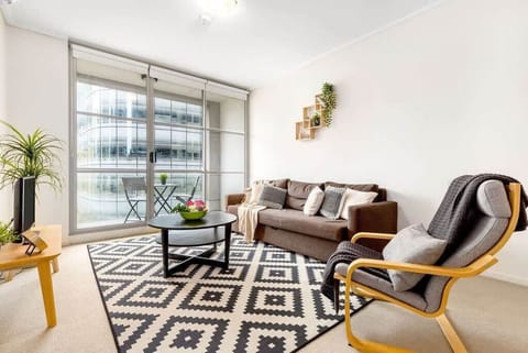 A spacious living with a 3-seater sofa bed that folds out to a double.