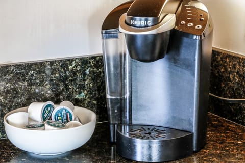 Keurig coffee maker with coffee pods provided for your convenience. 