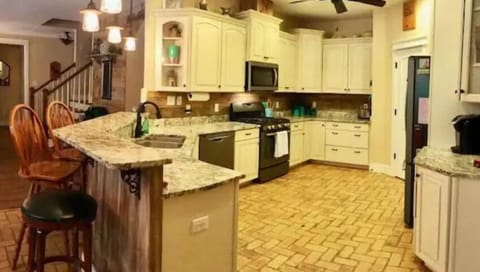 Big kitchen with granite countertops