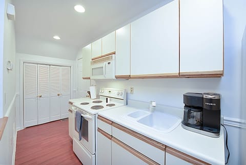 Kitchen equipped with Keurig, Coffee Maker, Air Fryer, Crockpot, and Toaster