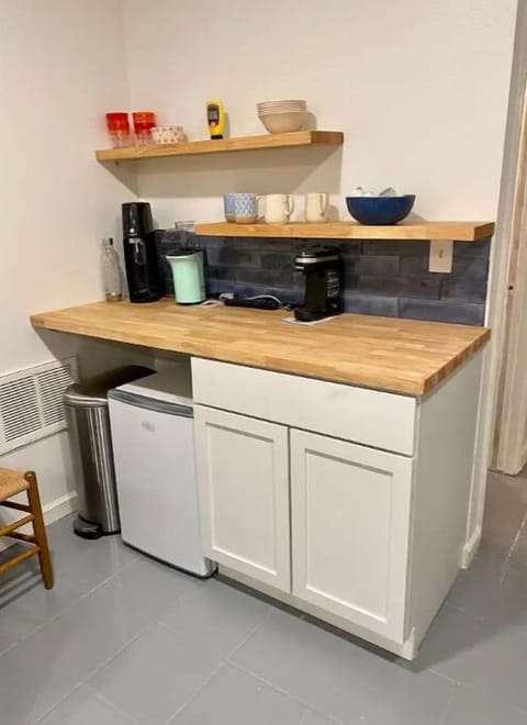 Kitchenette w/ Keurig, fridge, and popcorn maker. 