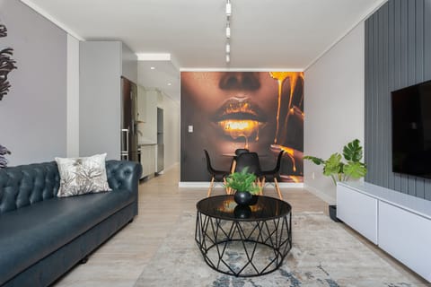 Exclusive Apartment | Living area | 50-inch flat-screen TV with cable channels, TV, Netflix