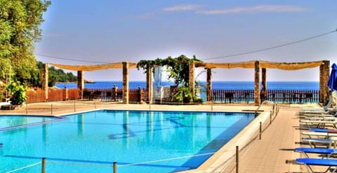 Seasonal outdoor pool, pool umbrellas, sun loungers