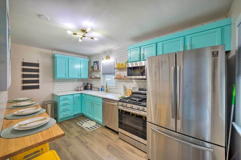 Counter height seating for four & a fridge large enough for all your goodies!