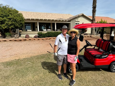 Owners and the view of the home from the golf course...