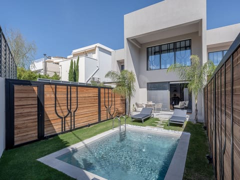 This modern and chic complex consists of 3 separate Villas, each one with its own private swimming pool