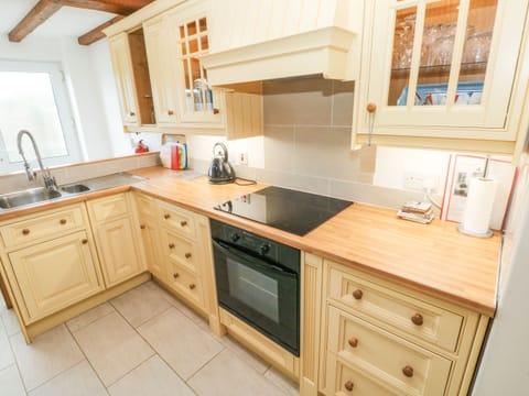 Fridge, electric kettle, toaster, cookware/dishes/utensils