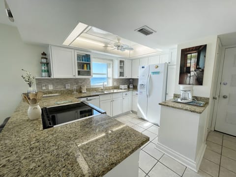 Condo, 2 Bedrooms | Private kitchen | Fridge, oven, coffee/tea maker, toaster