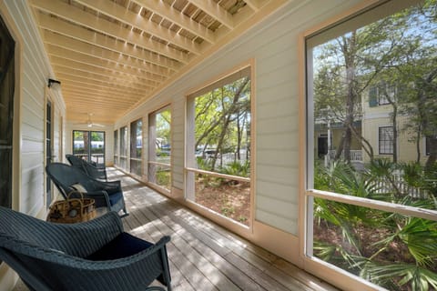 EXPANSIVE SCREENED IN PORCH WITH PRIVATE YARD DOWN
