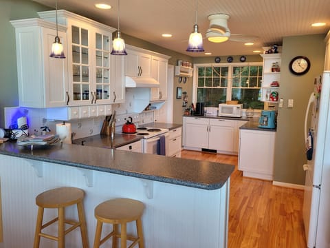 OVERVIEW:  The large kitchen at the cottage, which has all appliances including a dishwasher.