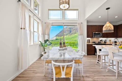 Sleek modern kitchen with inviting dining setup