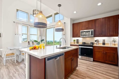 Sleek modern kitchen with inviting dining setup